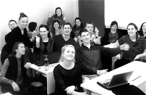 happy smiling TEFL students in a classroom